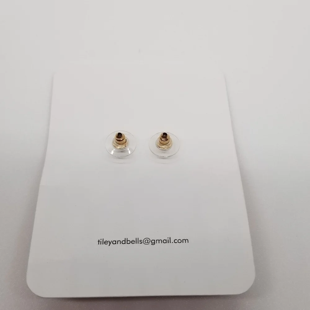 Gold tone bar earrings with pink threaded circles new on card